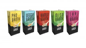 Four assorted juice boxes displayed, showcasing a variety of flavors and colorful packaging.