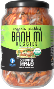 A jar of Ocean's Halo Organic Pickled Banh Mi Veggies with a green label.