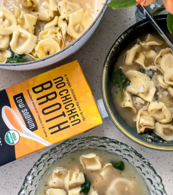 A warm bowl of slow cooker chicken noodle soup, featuring tender chicken, noodles, and fresh vegetables in a savory broth.