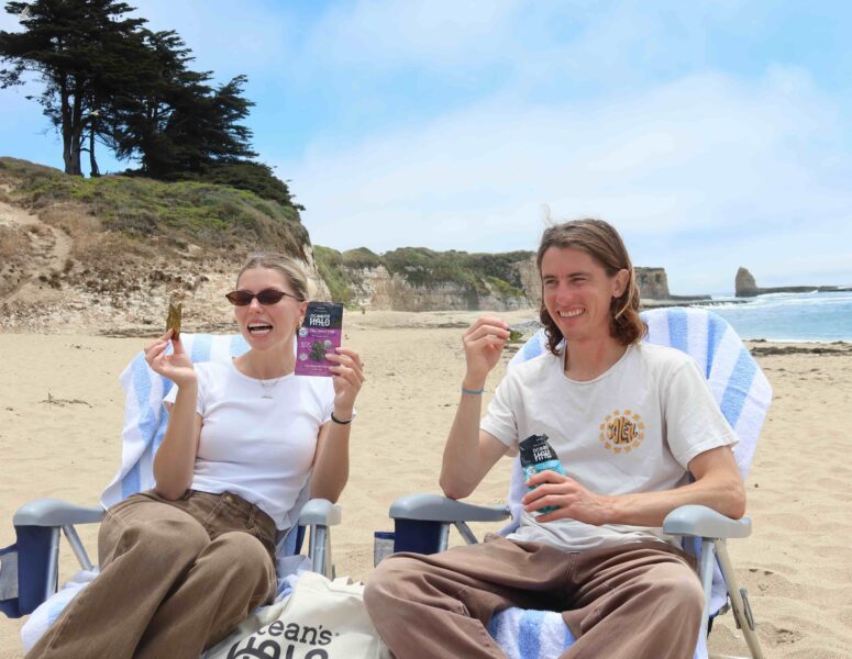 two people snacking on roasted seaweed snacks